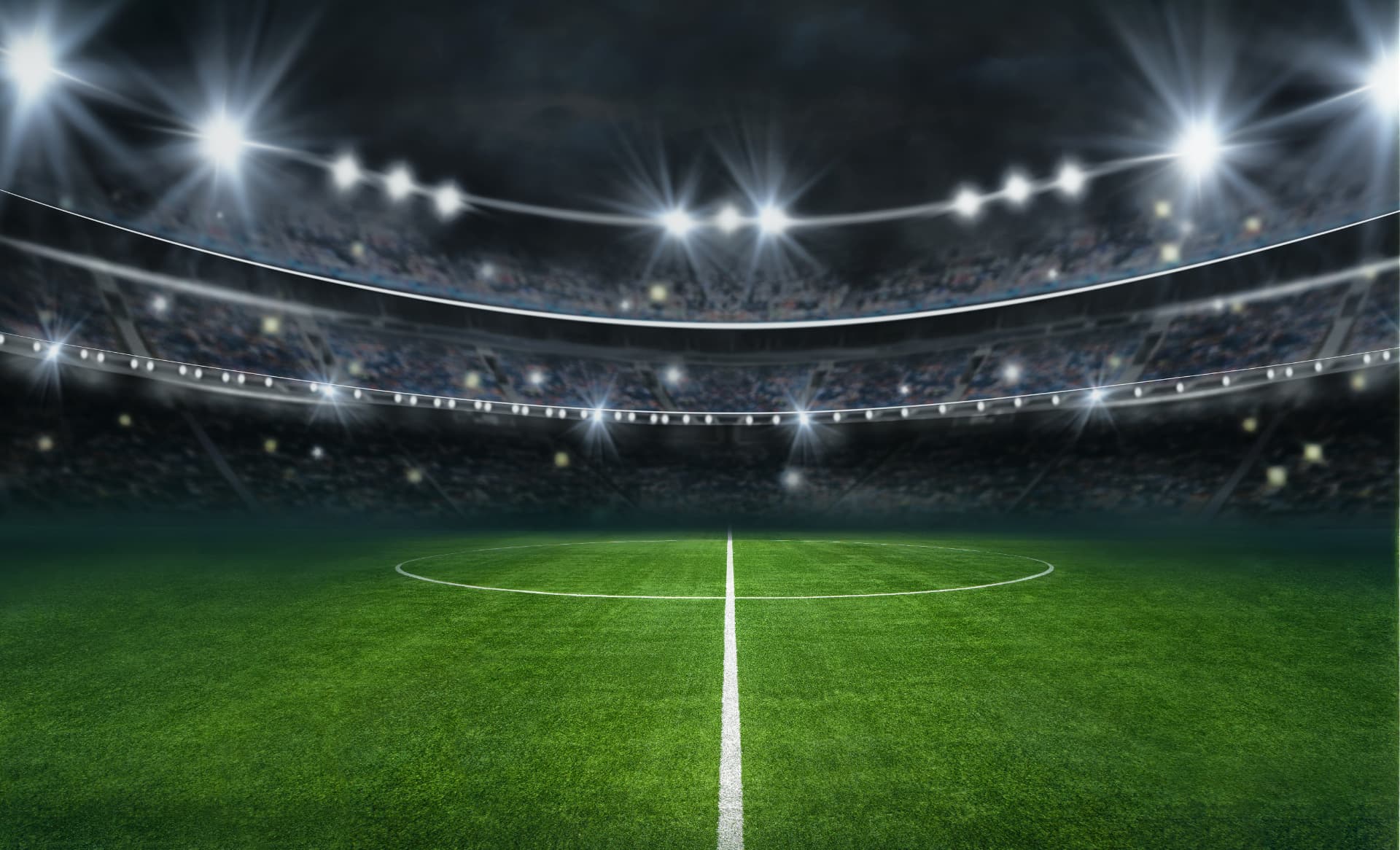 Floodlit soccer stadium at night